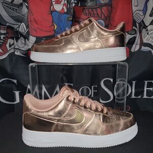 Nike Air Force 1 Metallic Rose Gold Sneakers with White Accents